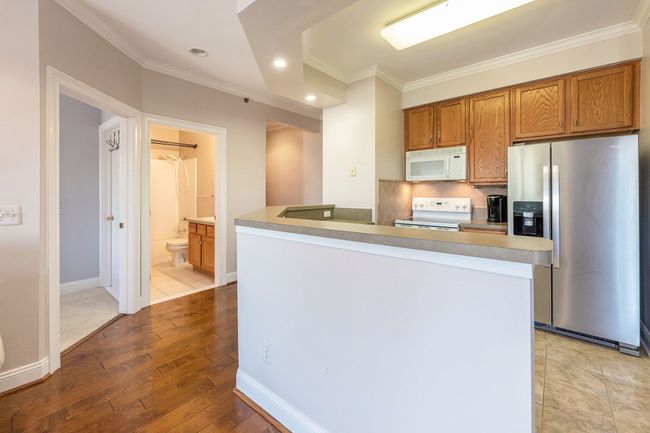 Suite includes high ceilings with Open floor plan | Image 11
