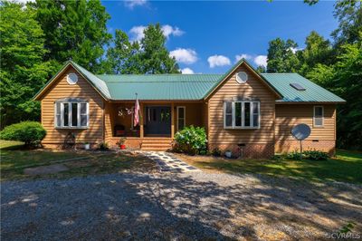 View of front of home with a porch | Image 1