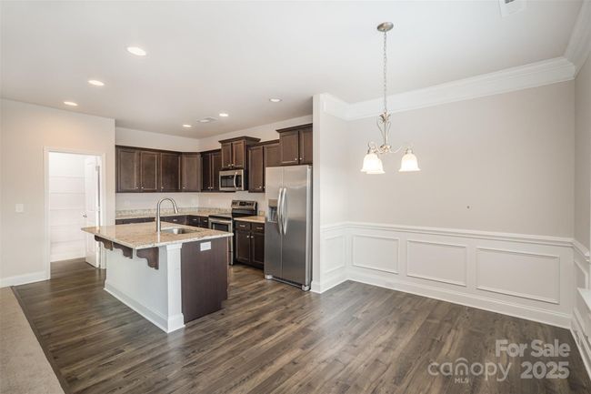 Spacious/Roomy Kitchen area, All Appliances Provided, walk-in pantry, crown moulding in eat-in dining area. | Image 9