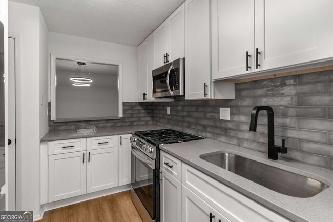 1003 Cumberland Ct Se, Condo with 2 bedrooms, 1 bathrooms and 2 parking in Smyrna GA | Image 15