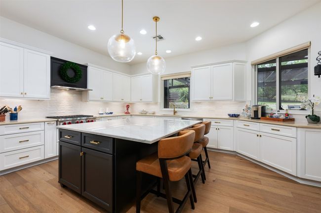 Gourmet kitchen with tons of storage and counter space. | Image 9