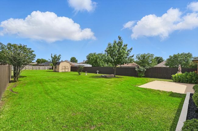 View of yard featuring a patio area | Image 34