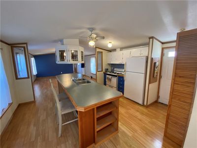 6381 Whispering Woods Drive, House other with 2 bedrooms, 2 bathrooms and null parking in Williamson NY | Image 2