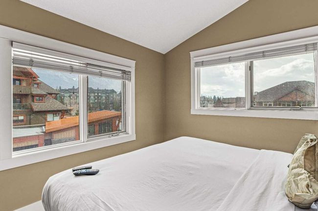 402 - 191 Kananaskis Way, Condo with 3 bedrooms, 3 bathrooms and 1 parking in Canmore AB | Image 35