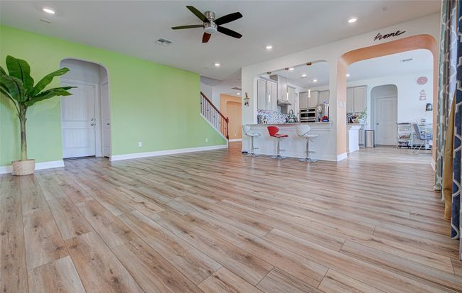Family Room with Extended Countertop & Arched Walkway - First Floor | Image 9