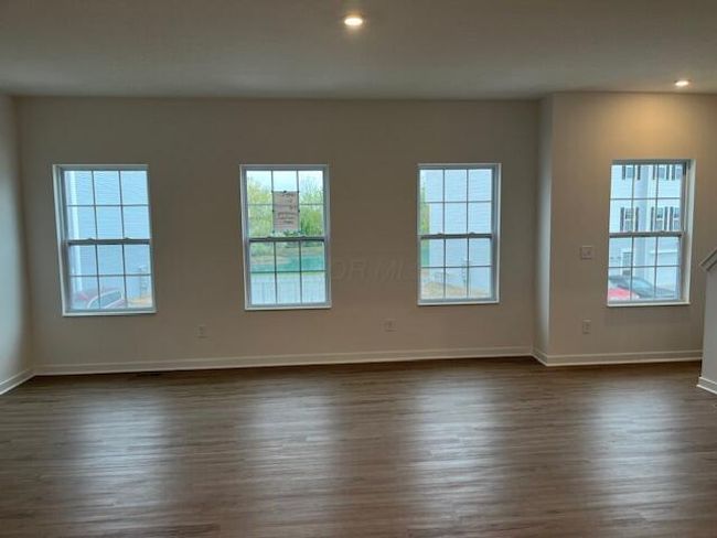 FAMILY ROOM - 17' x 15' w/4 WINDOWS & CEILING FAN ROUGH | Image 25
