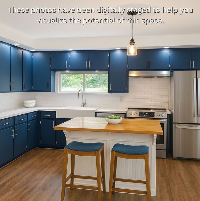 Kitchen featuring appliances with stainless steel finishes, blue cabinetry, and a sink | Image 7