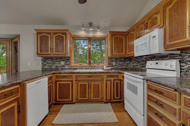 Spacious kitchen providing several surfaces to for cooking your favorite meal or entertaining | Image 6
