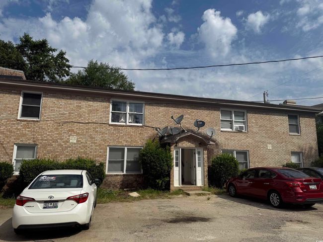 View of front facade with brick siding | Image 4