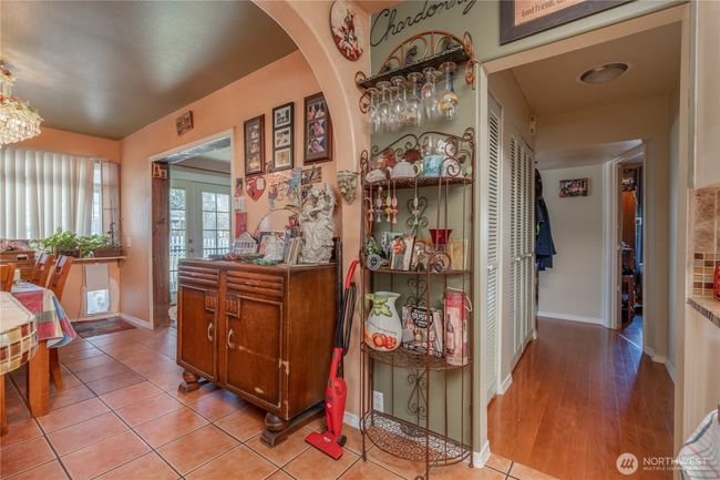 Tile and hardwood floors in main living space | Image 25
