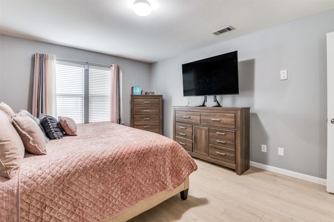 Nicely-sized primary bedroom. | Image 30
