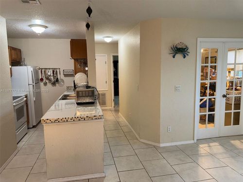 apt-31-220 Columbia Dr, Cape Canaveral, FL, 32920-3642 | Card Image
