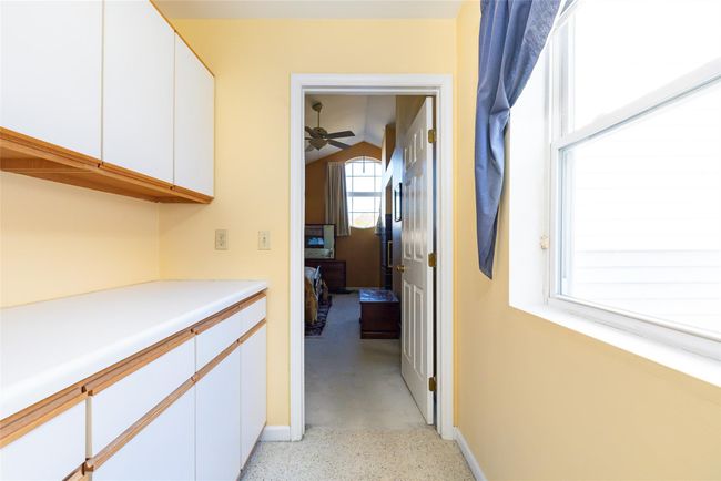 Hallway with vaulted ceiling | Image 23