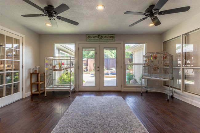 Doorway to outside with french doors, ceiling fan, wood-type flooring, and recessed lighting | Image 7