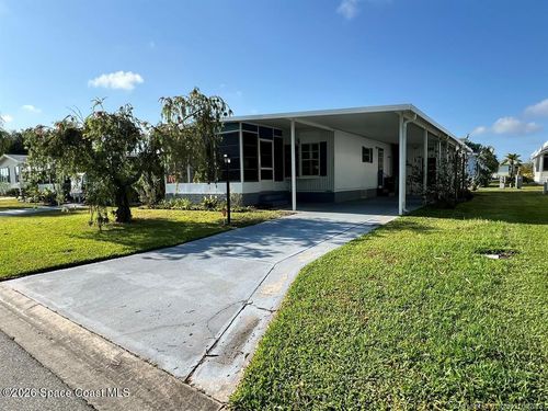 1005 Thrush Cir, Barefoot Bay, FL, 32976-7522 | Card Image