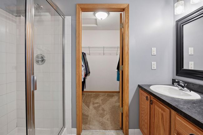 Primary suite | Separate stand up shower and large walk-in closet | Image 14