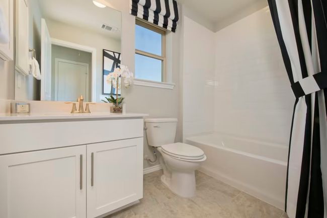 Photo of Pulte model home with same floor plan, not of actual home listed. | Image 14