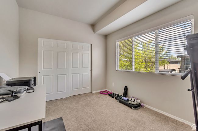Interior space with baseboards and carpet | Image 12