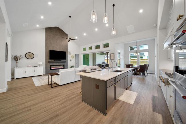 The open flow from kitchen to living/dining makes entertaining effortless. | Image 11