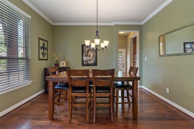 Gather with loved ones in the formal dining room. | Image 7