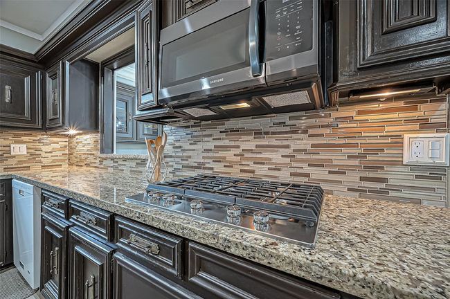 Sleek gas range for effortless cooking. | Image 20