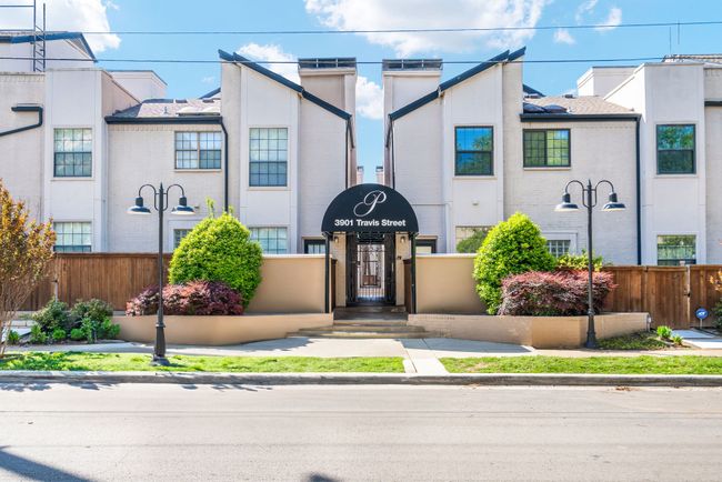 View of the front of the condo building. Landscape maintained by the HOA | Image 4