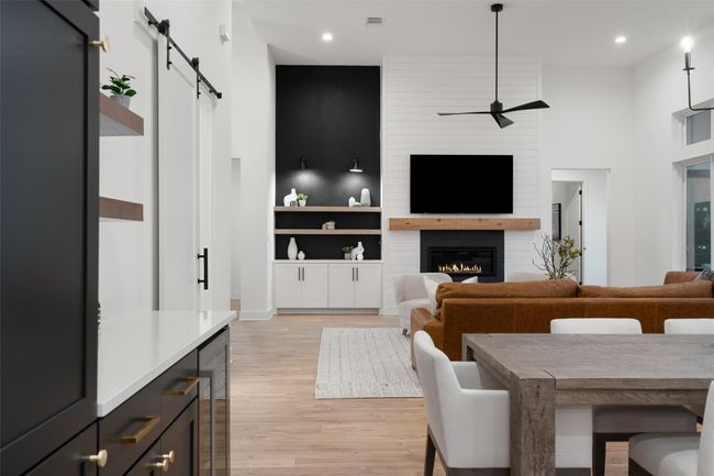 14ft+ ceilings in this one story 5 bedroom stunner! Open concept floorplan that is a WOW as soon as you walk through the front door. | Image 13