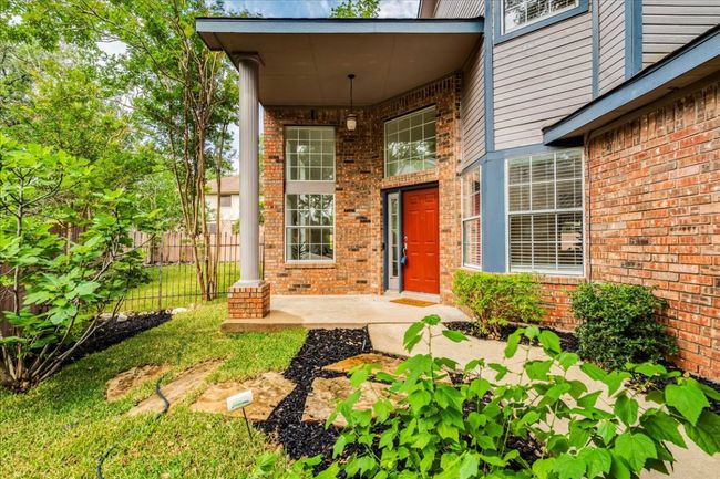 Entrance to property featuring fence and brick siding | Image 5
