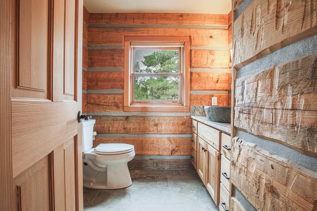 half bathroom off of side entrance | Image 27