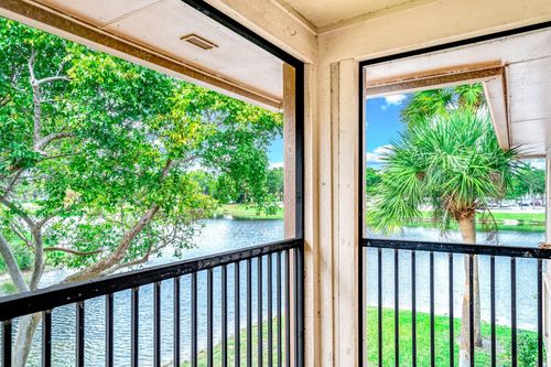 201-9933 N Belfort Cir, Tamarac, FL, 33321-1819 | Card Image