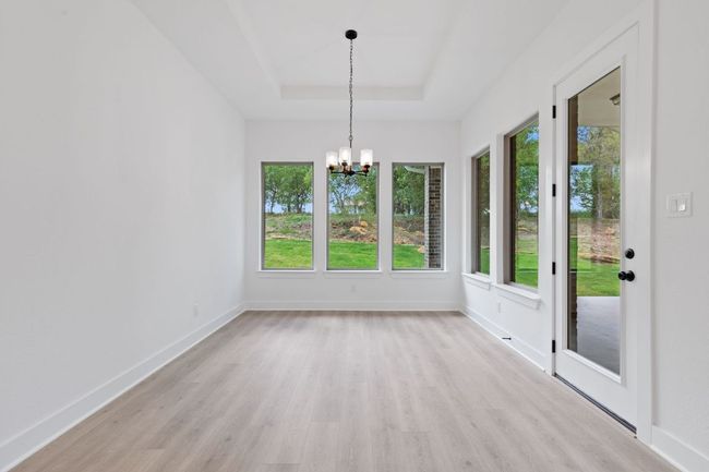 Casual Dining off of Kitchen | Image 12