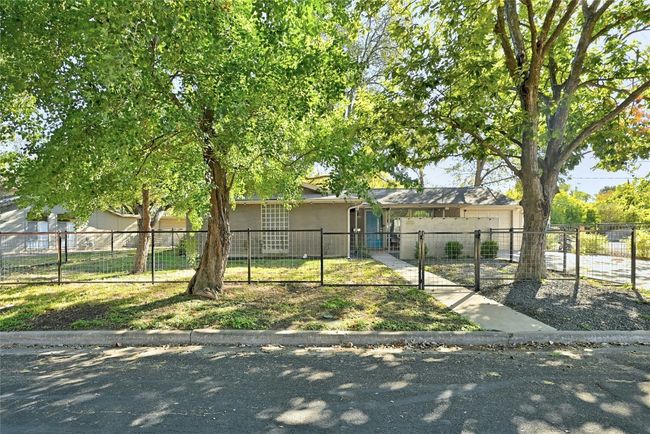 A charming and majestic street view that invites you inside. | Image 5
