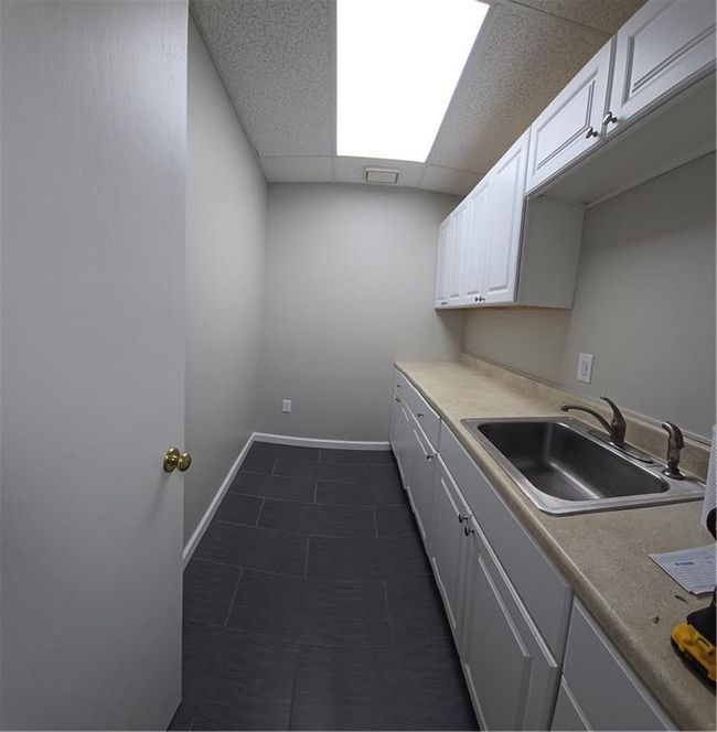 Kitchen with sink, white cabinets | Image 5