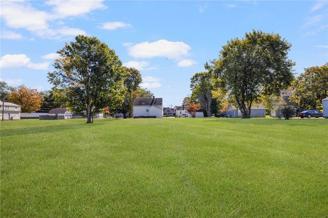 578 house on the left and 576 house and garage further up on the right. | Image 48