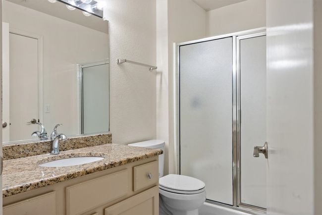 Full bathroom with vanity and a shower stall | Image 9