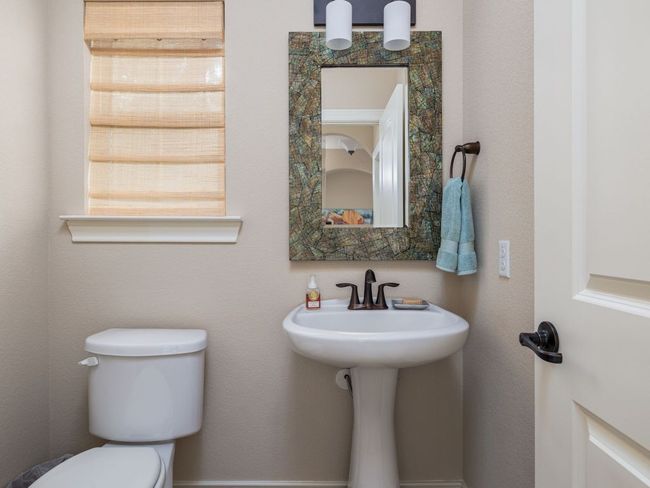 Half bath located next to art room. | Image 19