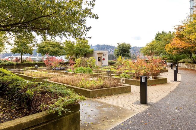 View of home's community featuring a garden | Image 24
