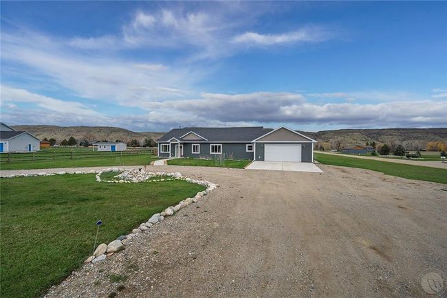 Circular drive for convenience. Front yard has been sodded. | Image 21