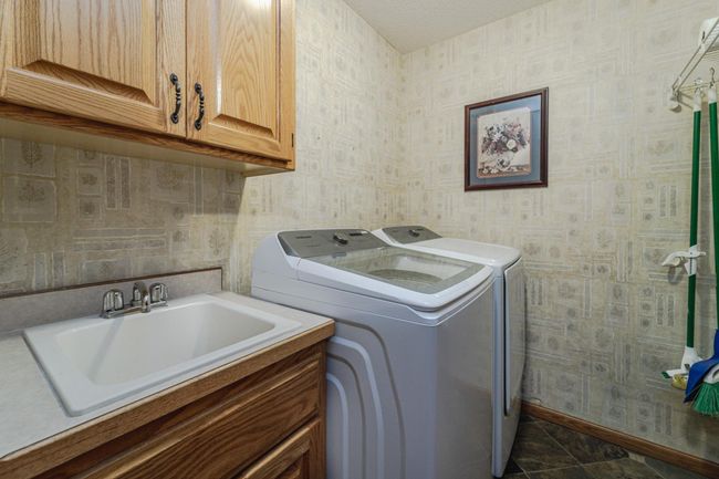 Full sized laundry with sink and cabinets! | Image 17