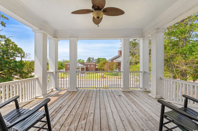 Wooden terrace with a ceiling fan | Image 36