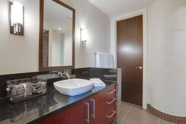 Bathroom with vanity and tile patterned floors | Image 26