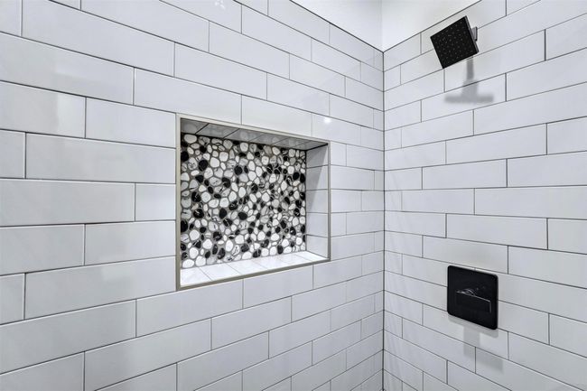 Full bath featuring a tile shower | Image 10