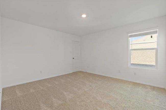 Spare room with light carpet and baseboards | Image 13