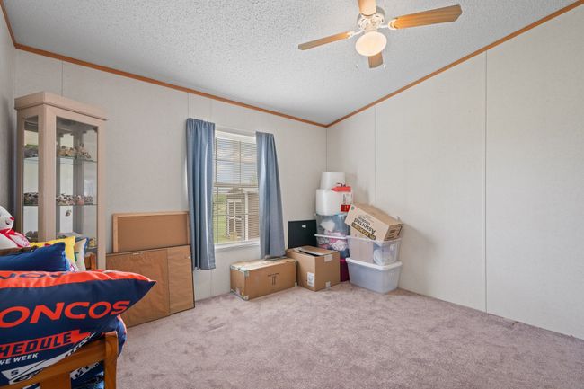 Bedroom #3 with ceiling fan and walk in closet | Image 23