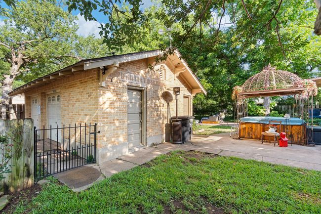 View of outbuilding with a hot tub and a gazebo | Image 34