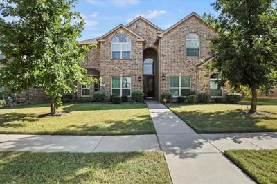 View of front of property with a front yard | Image 1