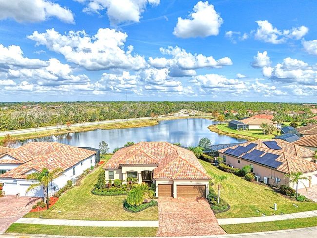 Aerial View of House on Lake | Image 5