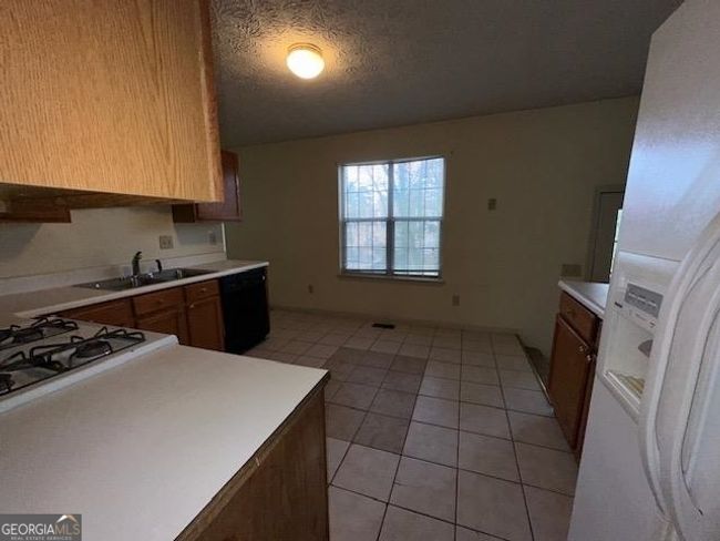 4850 Streamside Dr, House other with 3 bedrooms, 3 bathrooms and null parking in Johns Creek GA | Image 6