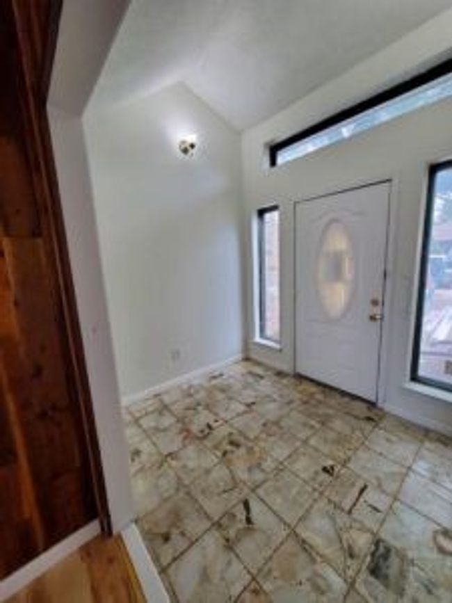 Foyer with lofted ceiling | Image 6