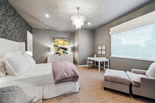 Another view of Bedroom #4 showing the expansive window allowing for natural light to emanate the space. | Image 30